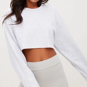Pretty little thing cropped sweater